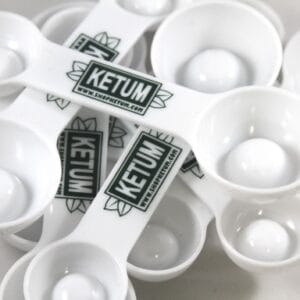 Double sided measuring spoons